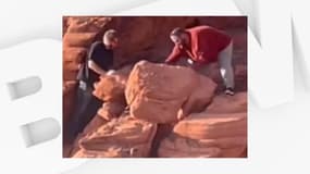 Deux hommes dégradant des roches à Lake Mead au Nevada, le dimanche 7 avril 2024.