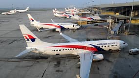 Des avions de la Malaysia Arlines garés sur le tarmac de l'aéroport de Kuala Lumpur, le 30 mars 2014.