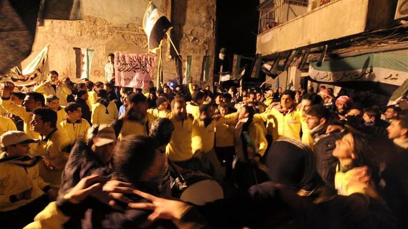 Manifestation à Alep à l'occasion du deuxième anniversaire du début de l'insurrection en Syrie. Au bout de deux années, le bilan s'établit à plus de 70.000 morts, à des millions de personnes déplacées et plus d'un million de réfugiés. /Photo prise le 17 m