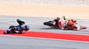 Miguel Oliveira et Marc Marquez au sol lors du Grand Prix du Portugal