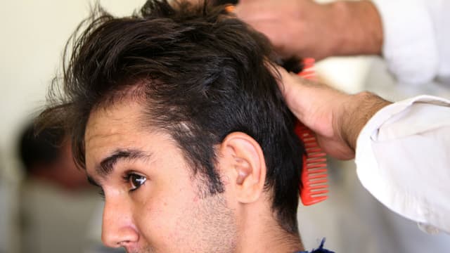 L'Iran veut interdire les coupes jugées "sataniques"