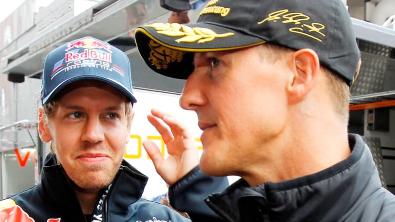 Sebastian Vettel (à g.) et l'idole de sa jeunesse, Michael Schumacher.