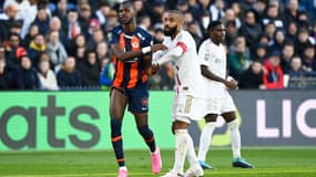 Boubakar Kouyaté et Alexandre Lacazette lors de Montpellier-Lyon, 11 février 2024