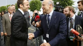 Emmanuel Macron et Alain Juppé, à Villepinte, le 16 juin 2016.