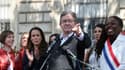 L'Insoumis Jean-Luc Mélenchon s'exprime lors de la manifestation du 1er mai à Paris 