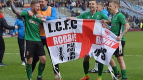 Les joueurs de Lincoln City fêtent la qualification