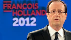 François Hollande a dévoilé jeudi les soixante propositions de son projet présidentiel, qui prévoit notamment 20 milliards d'euros de dépenses nouvelles sur cinq ans s'il est élu et le retour à l'équilibre budgétaire en 2017. /Photo prise le 26 janvier 20