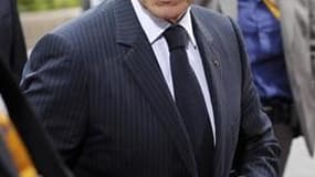 Nicolas Sarkozy gagne 6 points en un mois, 36% des Français se disant satisfaits de son action, selon un sondage Ifop à paraître dans Le Journal du Dimanche. La proportion de mécontents baisse de 6 points à 64%. /Photo prise le 21 juillet 2011/REUTERS/Eri
