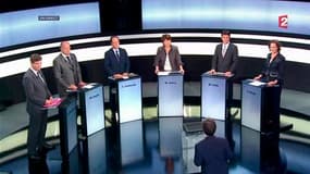 Les six candidats à la primaire PS, (de gauche à droite) Arnaud Montebourg, Jean-Michel Baylet, Francois Hollande, Martine Aubry, Manuel Vals et Ségolène Royal. François Hollande a dénoncé jeudi "la richesse insolente" et Martine Aubry prôné la suppressio