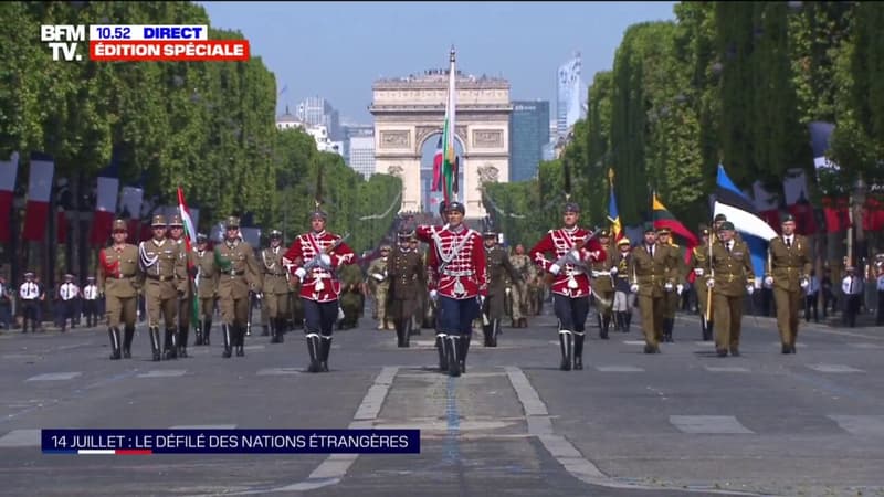 14-Juillet: venues d'Europe de l'Est, les troupes des nations étrangères invitées défilent sur les Champs-Élysées