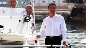 En 2013, Manuel Valls à Antibes avec Eric Ciotti, sur une vedette de la police.