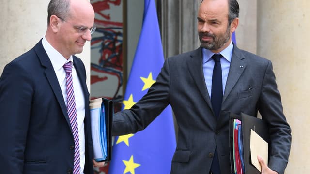 Jean-Michel Blanquer et Edouard Philippe devant l'Elysée. - Alain JOCARD / AFP