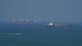 Des navires pétroliers naviguent dans le détroit d'Ormuz au large de l'île iranienne de Qechm, le 28 avril 2026 (photo d'illustration).