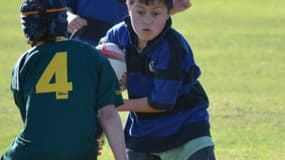 Maillot bleu et noir pour les enfants de Te Puna