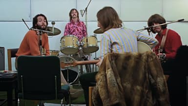 Paul McCartney, Ringo Starr, John Lennon et George Harrison, en répétition en 1969. 