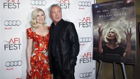 Les acteurs Kirsten Dunst et Udo Kier, qui figurent tous deux au générique de "Melancholia", lors d'une projection du film à Hollywood en novembre dernier. Le long-métrage du réalisateur danois Lars von Trier a été désigné samedi meilleur film de l'année