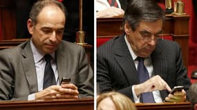 Jean-François Copé et François Fillon, mardi à l'Assemblée. Les deux hommes ont reporté à jeudi leur quatrième tête-à-tête pour tenter de régler la crise à l'UMP, alors que les députés "fillonnistes" ont fait pour la première fois groupe à part, mercredi,