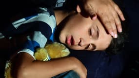 Jeune migrant syrien à la frontière entre la Hongrie et la Serbie.