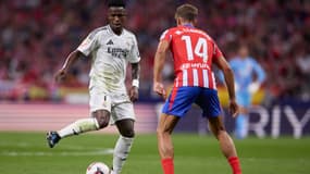 Vinicius Jr et Marcos Llorente lors du derby madrilène le 29 septembre 2024.