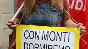 Dans les rues de Rome. Deux des principaux syndicats italiens ont appelé à une grève de 24 heures vendredi dans la fonction publique pour protester contre les coupes budgétaires mises en oeuvre par le gouvernement de Mario Monti. /Photo prise le 28 septem