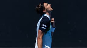 Arthur Rinderknech face à Frances Tiafoe à l'Open d'Australie le 13 janvier 2025