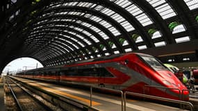 This photograph taken on July 7, 2023 shows a Freccia Rossa (Red Arrow) high-speed train of Trenitalia train operator at the central railway station in Milan.