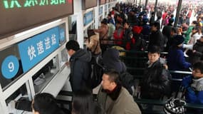 Gare e Pékin en 2012 lors de la migration de millions de Chinois pour le nouvel an