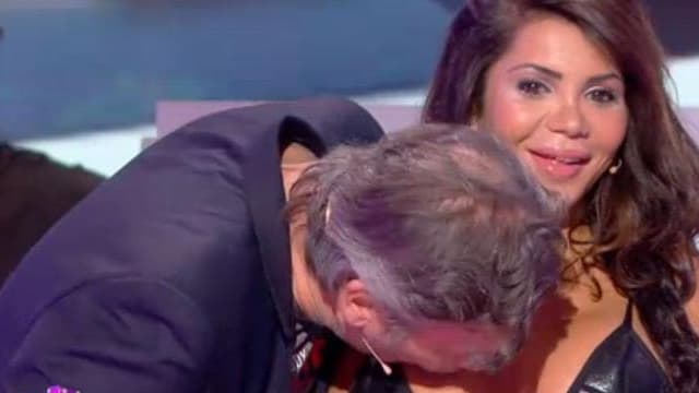 Jean-Michel Maire, chroniqueur de l'émission de Cyril Hanouna, sur C8, embrassant Soraya.