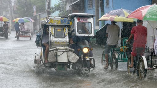 A Manille, capitale des Philippines, touchée elle aussi par le typhon Utor, le 12 août 2013.