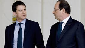 Manuel Valls et François Hollande à la sortie de l'Elysée, le 4 avril 2014.