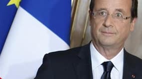 Une majorité de Français (59%) sont satisfaits de l'action de François Hollande, soit une baisse de deux points en un mois, selon le baromètre Ifop pour le Journal du dimanche. /Photo prise le 9 juin 2012/REUTERS/Bertrand Langlois/Pool