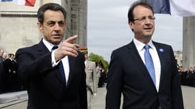 François Hollande et Nicolas Sarkozy en mai 2012, au pied de l'Arc de Triomphe, à Paris.