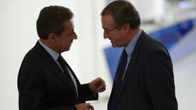 Nicolas Sarkozy et Hervé Mariton au siège de l'UMP le 2 décembre 2014.