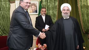 Patrick Pouyanné, le PDG de Total, en compagnie du président iranien Hassan Rohani.