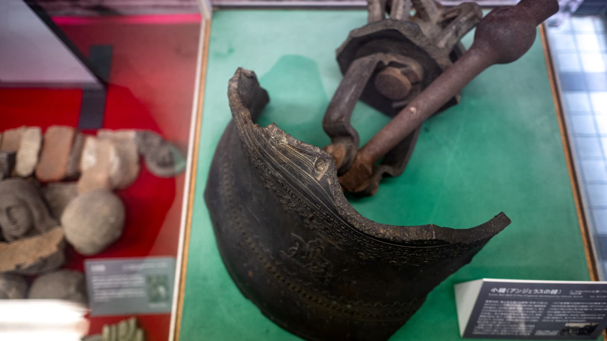Part of the Bell Torre (Bell of the Angelus), destroyed by the atomic bomb, in the exhibition hall of the vestiges of the atomic bomb of the Urakami Cathedral, in the city of Nagasaki Part of the Bell Torre (Bell of the Angelus), destroyed by the atomic bomb, in the exhibition hall of the vestiges of the atomic bomb of the Urakami Cathedral, in the city of Nagasaki