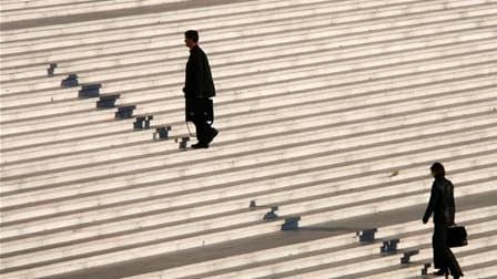 Dans un arrêt très attendu, la cour de cassation a conclu que le régime du "forfait-jours" qui régit l'organisation du temps de travail d'environ 1,6 million de salariés en France n'était pas remis en cause. /Photo d'archives/REUTERS/John Schults