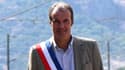 Luc Jousse, maire de Robquebrune-sur-Argens, portant l'écharpe républicaine.