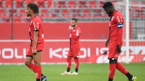 Sacha Boey et Bruno Ecuelé-Manga après une défaite de Dijon