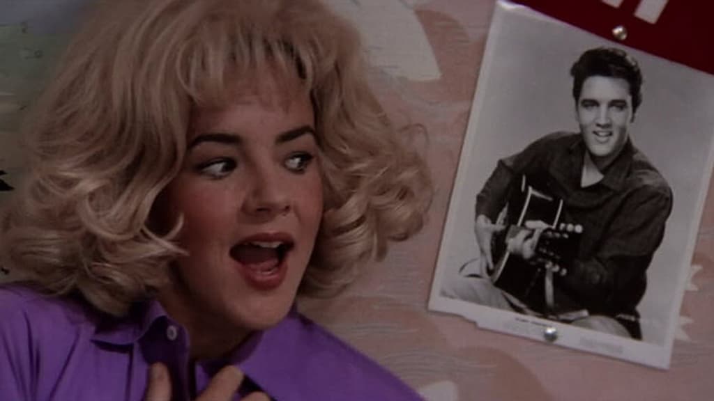 Une photo d'Elvis dans une scène de Grease Une photo d'Elvis dans une scène de Grease