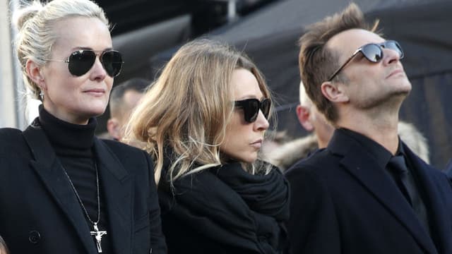 Laeticia Hallyday, Laura Smet et David Hallyday lors des obsèques de Johnny à Paris, le 9 décembre 2017