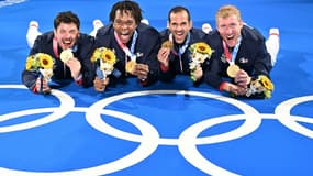 La joie des fleurettistes français Maxime Pauty, Enzo Lefort, Erwan Le Pechoux et Julien Mertine, champions olympiques, après leur victoire face à la Russie, le 1er août 2021 aux Jeux Olympiques de Tokyo 2020
