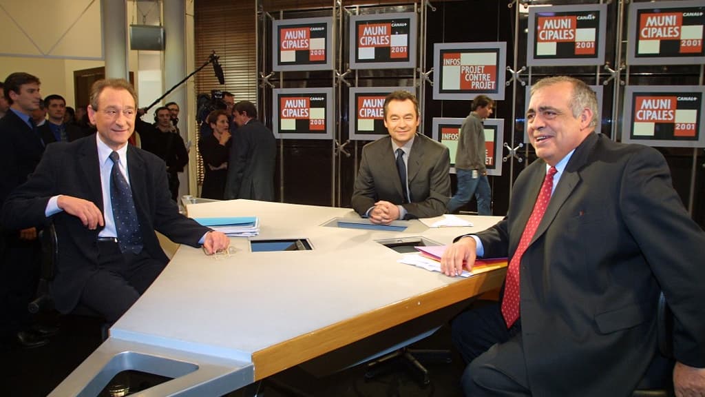 Le "miraculé" Bertrand Delanoë et Philippe Séguin lors du duel télévisé sur Canal+, le 28 février 2001. Le "miraculé" Bertrand Delanoë et Philippe Séguin lors du duel télévisé sur Canal+, le 28 février 2001.