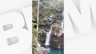 Image d'un sauvetage spectaculaire au bord d'une cascade à La Réunion.