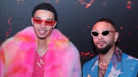Hugo Ekitike et Layvin Kurzawa lors du défilé Louis Vuitton de la Fashion Week à Paris, le 16 janvier 2024
