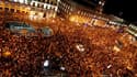Les "Indignados" espagnols sont revenus vendredi, Puerta del Sol, à Madrid, pour protester contre des violences policières. /Photo prise le 5 août 2011/REUTERS/Sergio Perez