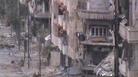 Bâtiments en ruines dans une rue de Homs, en Syrie, où les combats s'intensifient alors que la diplomatie est dans l'impasse. La France ne ménage pas ses efforts pour rechercher une solution politique à la crise syrienne mais le conflit s'enlise et les op