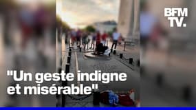 Un homme allume sa cigarette avec la flamme de la tombe du Soldat inconnu