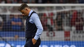 Phil Neville, dépité mais "fier" de ses joueuses après la défaite de l'Angleterre face aux Etats-Unis (2-1). 