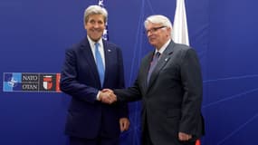 Witold Wasczczykowski et John Kerry au sommet de Varsovie
