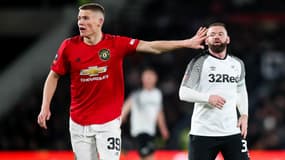 Scott McTominay et Wayne Rooney lors du match Manchester United-Derby County, le 5 mars 2020